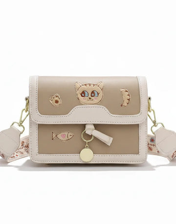 Liora Noelle Small Beige Sling Bag with Cat Design Strap