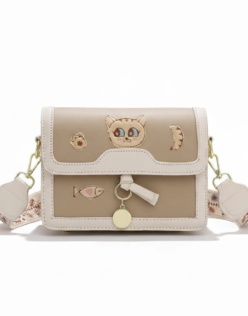 Liora Noelle Small Beige Sling Bag with Cat Design Strap
