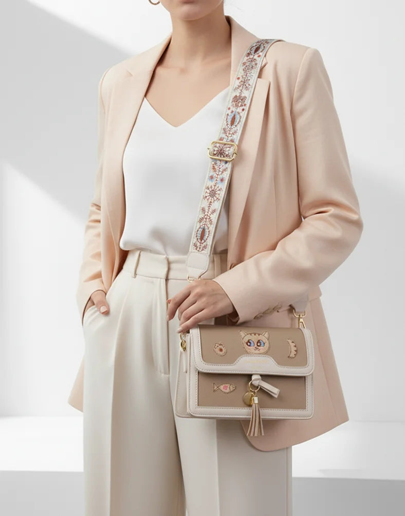 Liora Noelle Small Beige Sling Bag with Cat Design Strap